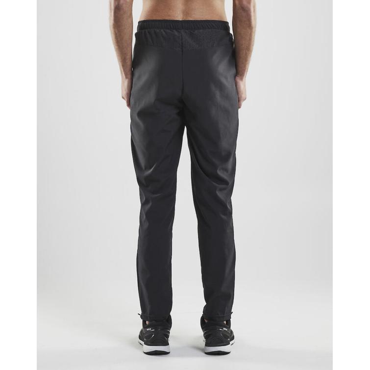 Miesten joustavat tuulihousut IdVo logolla